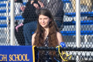 female student at outdoor podium