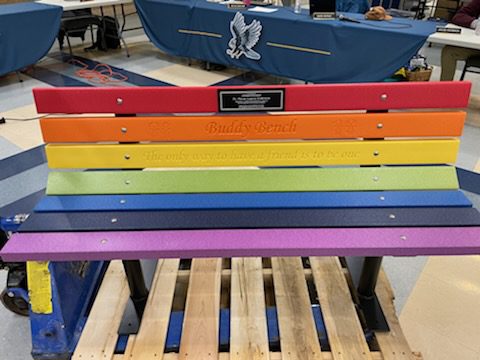 a rainbow buddy bench